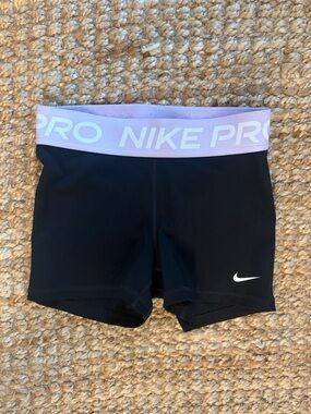 Nike Pros With Light Purple Logo Band